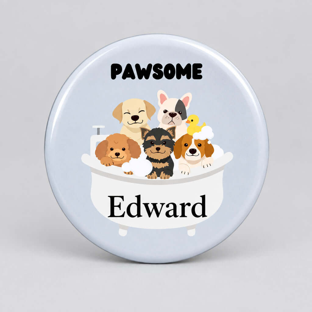 Five round custom pet memorial plaques shown on a white background, each with a different illustrated design: three cats and a dog in a bathtub, a Highland cow, a robin bird, and a skull with roses. Each plaque has a name printed on it, including Sabrina, Edward, Colleen, Mum, and Jacob.