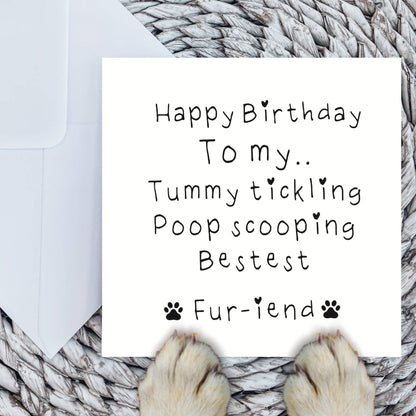 Birthday card for a pet with paw prints and text on a textured surface